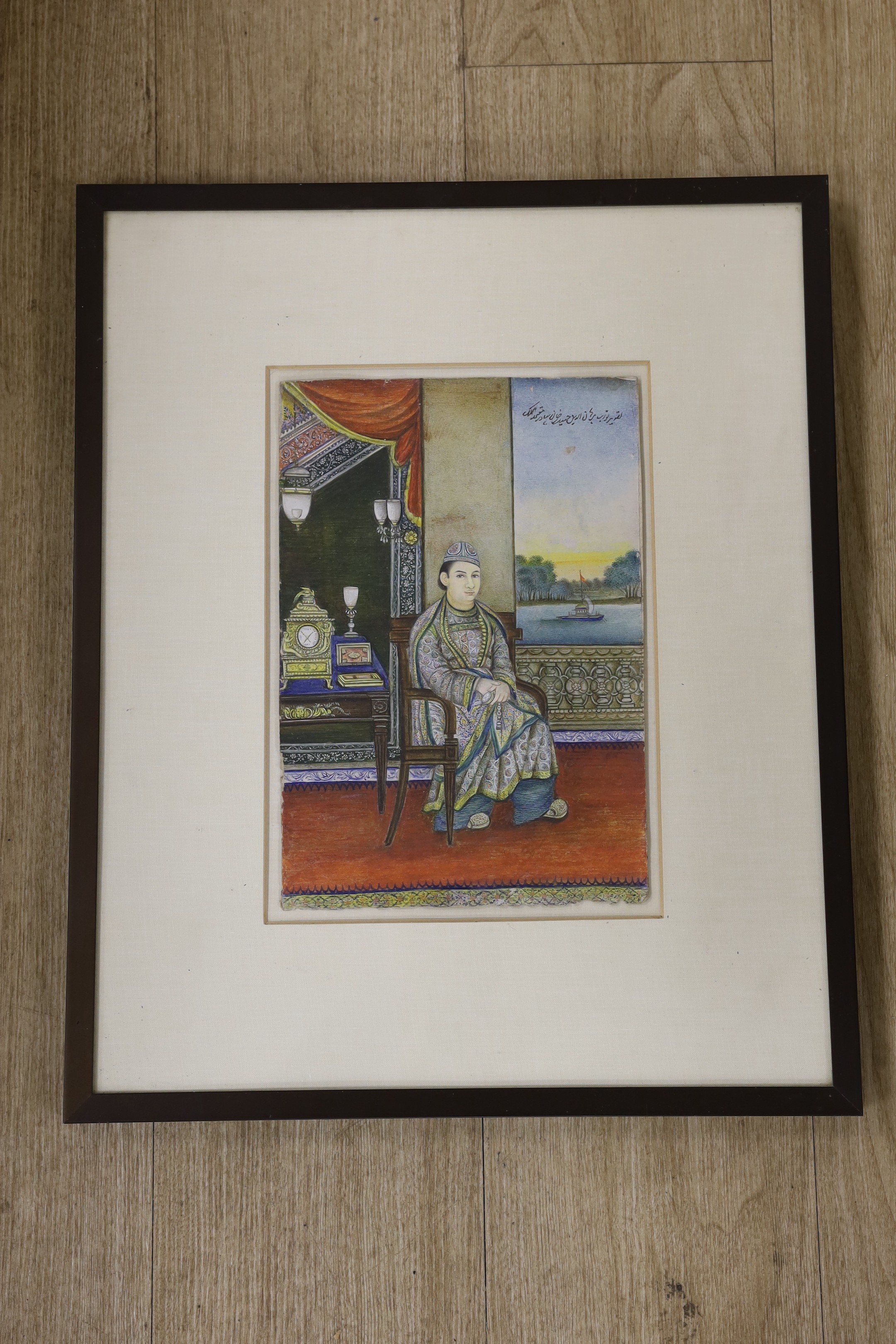 Indian school, miniature watercolour, Portrait of the Nawab of Oudh, riverscape beyond, 29.5 x 20cm